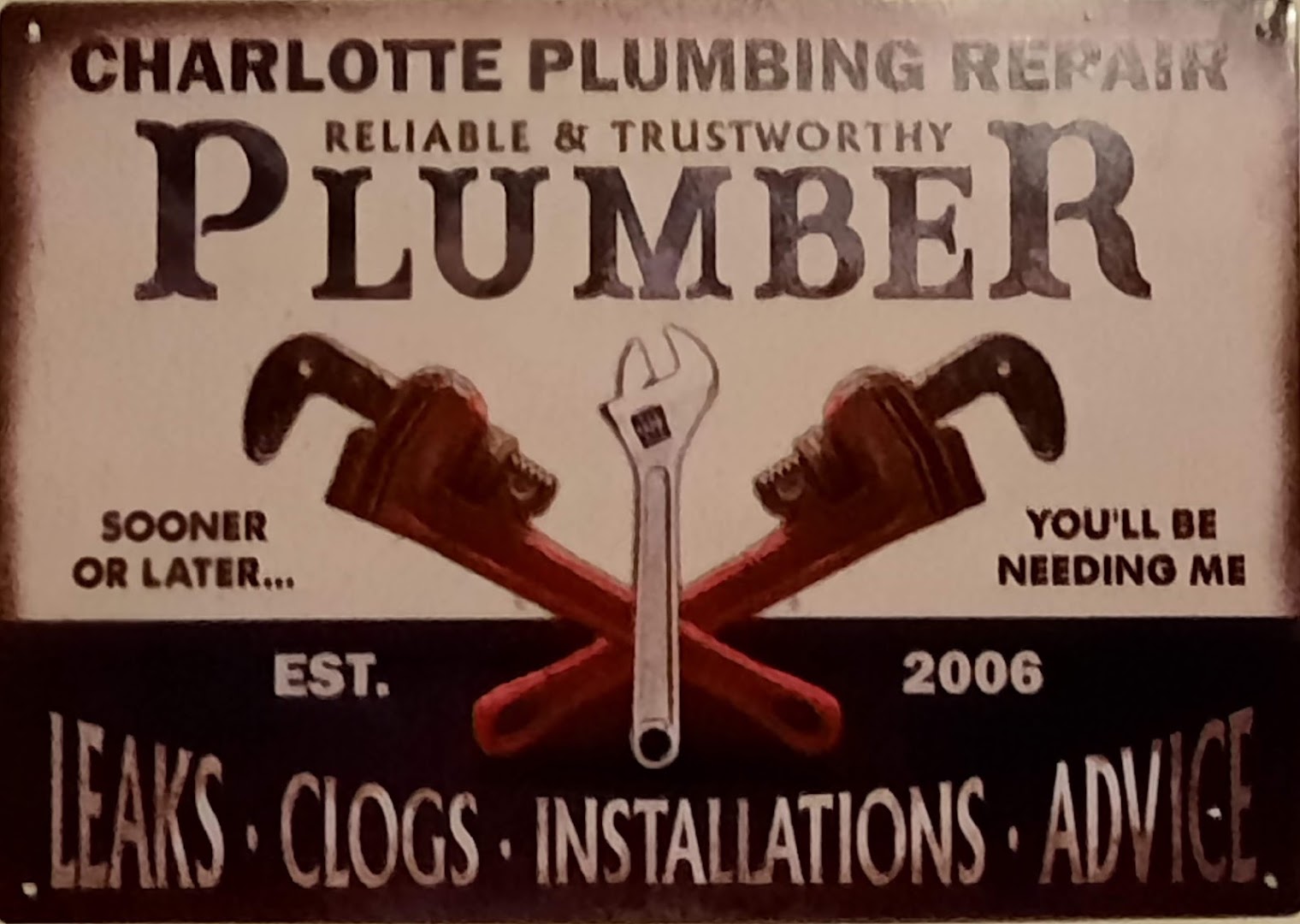 Charlotte Plumbing Repair truck and technician on a job